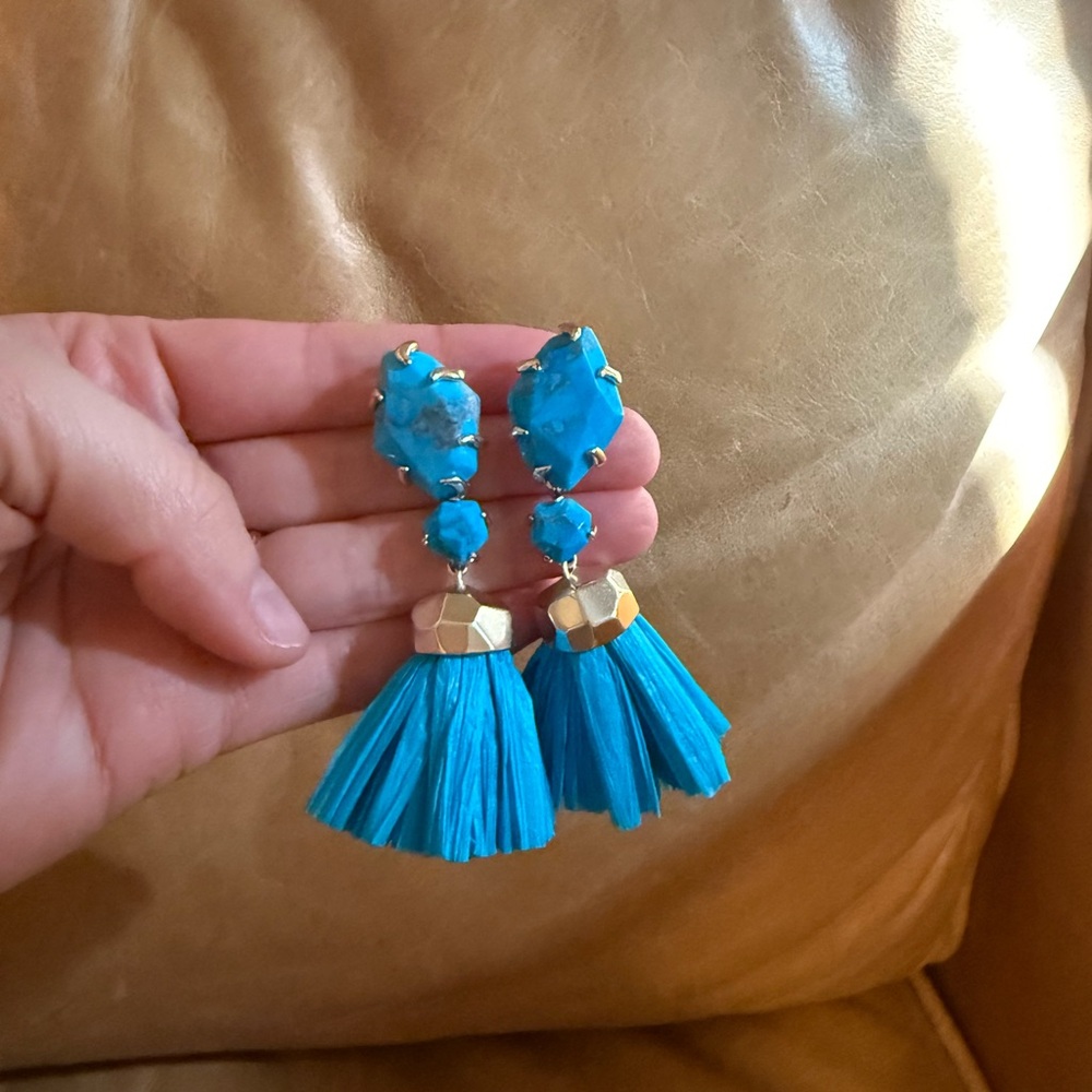 Teal Kendra Scott earrings.